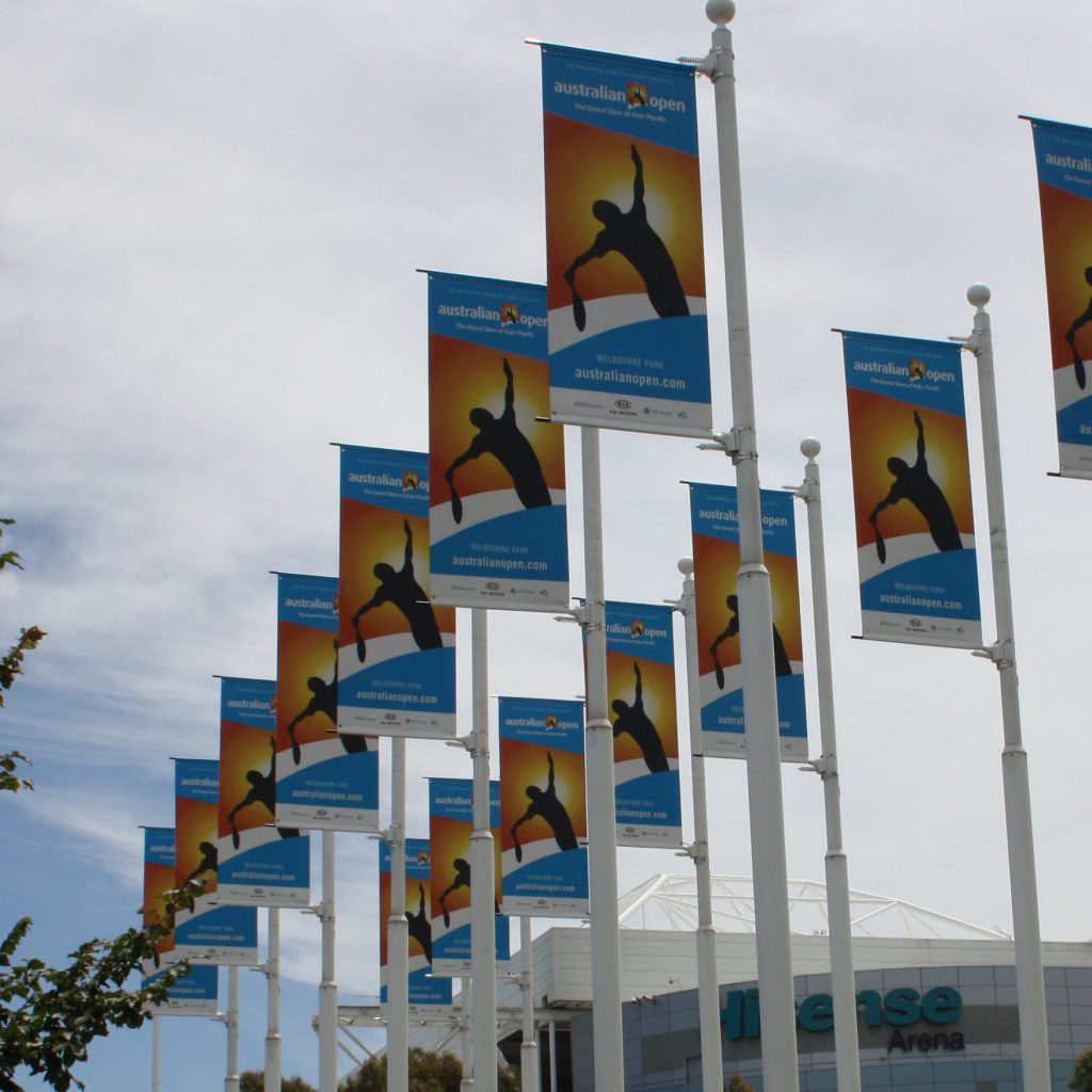 Light Pole Flags with spring loaded flag brackets Bay Media