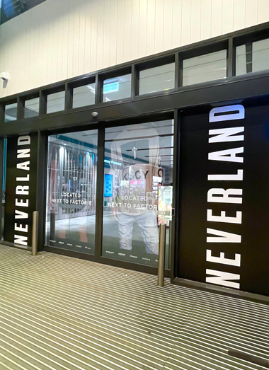Bay Media's Window Graphic decals applied to the entry doors of a shopping centre
